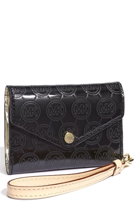 michael kors iphone clutch|Michael Kors clutches on sale.